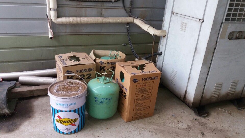 Typical materials on a compressor or refrigerant job. The green cylind